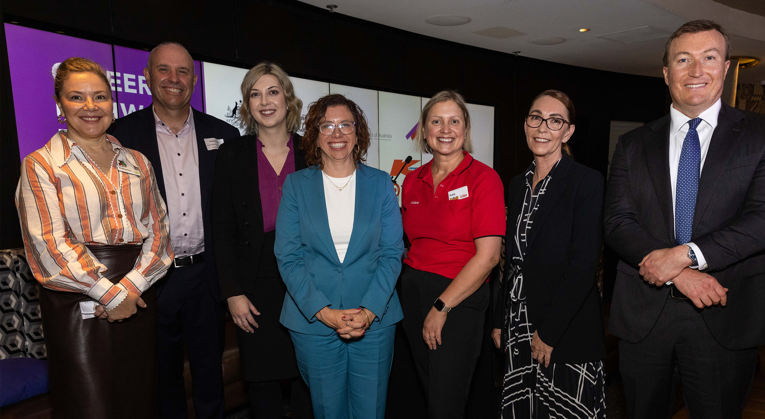 At the launch of the Career Pathways Pilot at Kmart Broadway:Left to right: Catherine Hunter, Woolworths; Tristram Gray, Kmart & Target Australia; Amber O’Shea, Australian Disability Network; Minister Amanda Rishworth; Katie Wyatt, Coles; Suzy Hudson Tasker, Compass and Bran Black, Business Council of Australia.